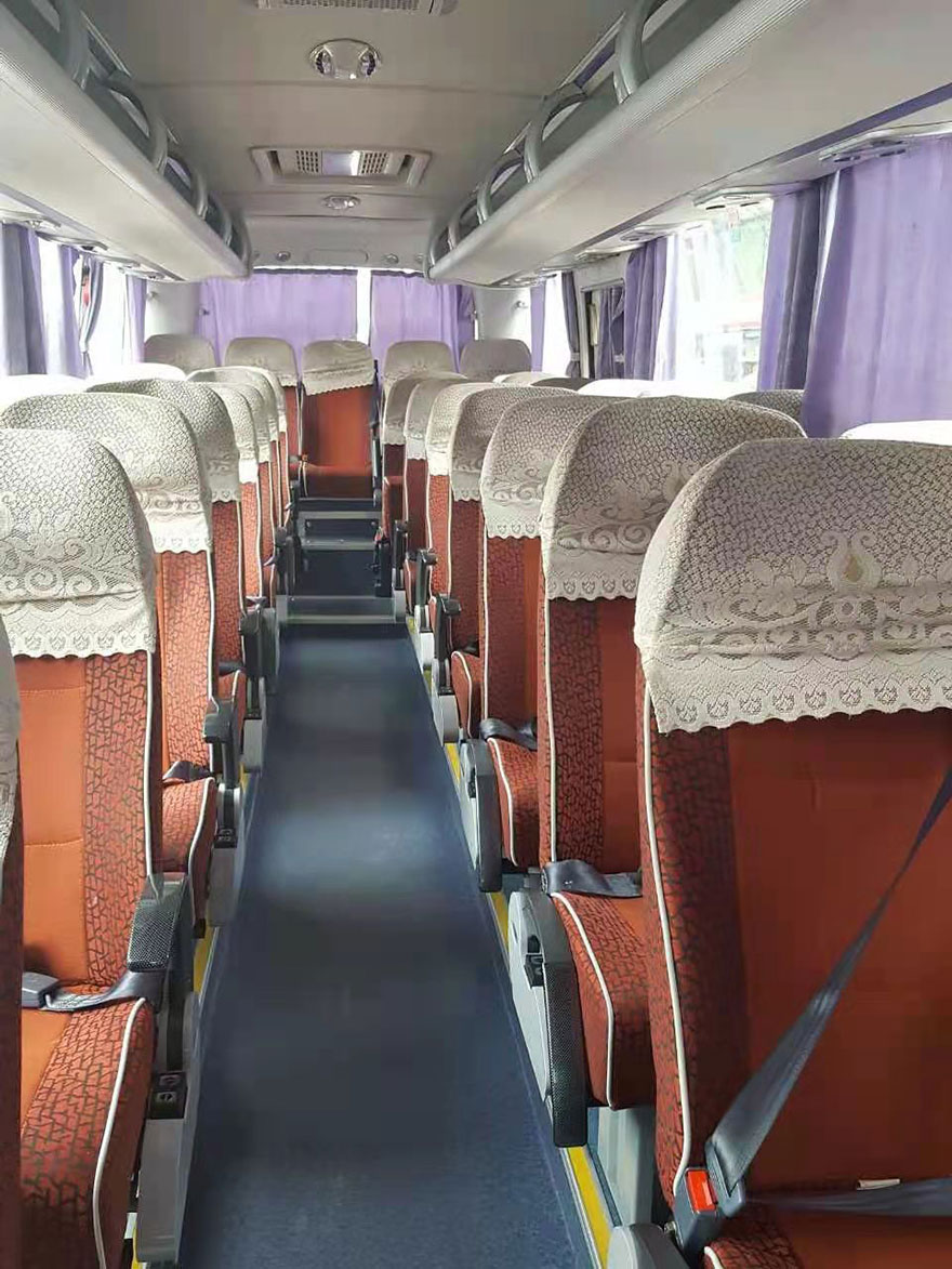 廣州旅游配帶司機隨駕出租50多人座市際帶證大巴客車包天費用價格(54座)_廣州租車包車用車 首選廣州現達汽車租賃公司
